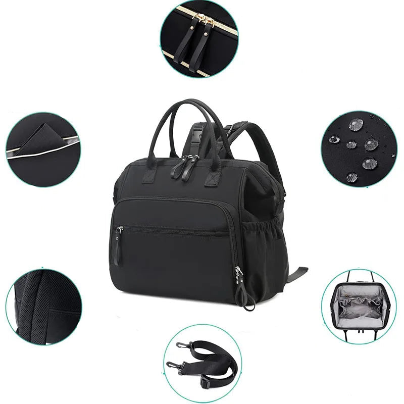 Black polyester diaper backpack with high-quality zippers, front pocket, water-resistant fabric, and wide-open interior.