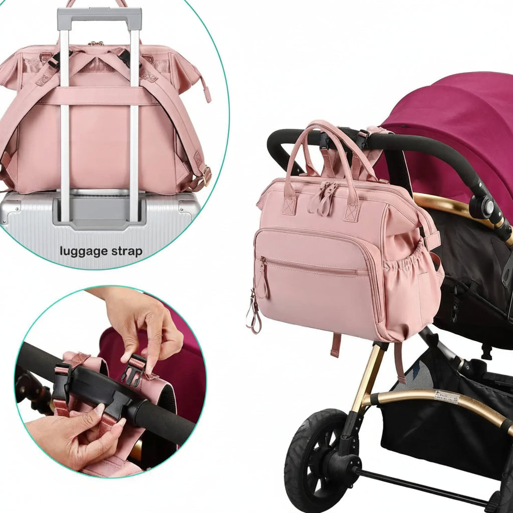Pink polyester diaper backpack attached to a stroller and luggage, showing built-in straps.