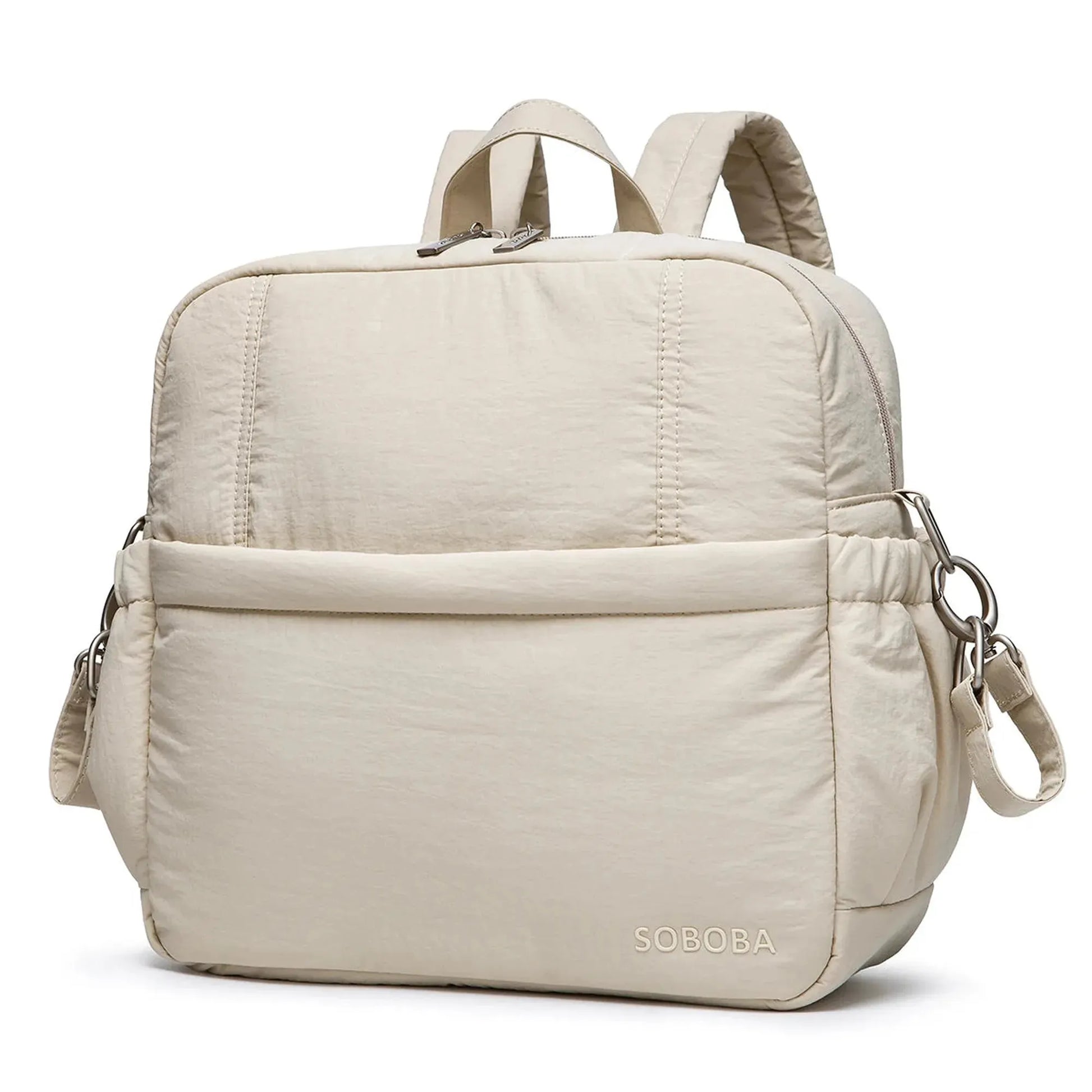Light beige multi-functional diaper backpack with top handles, padded straps, and front pocket, "SOBOBA" logo.