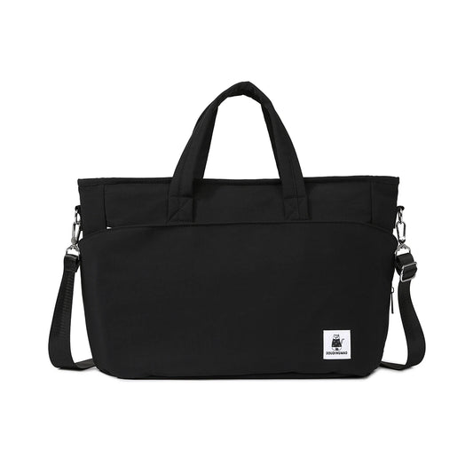 Black Oxford fabric diaper bag with top handles, shoulder strap, and front pocket.