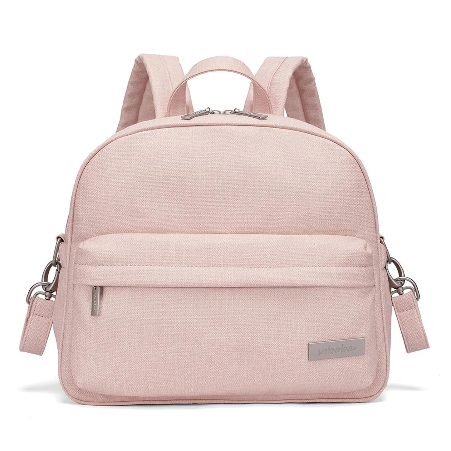 Stylish pink diaper backpack with front pocket, adjustable straps, and silver hardware.