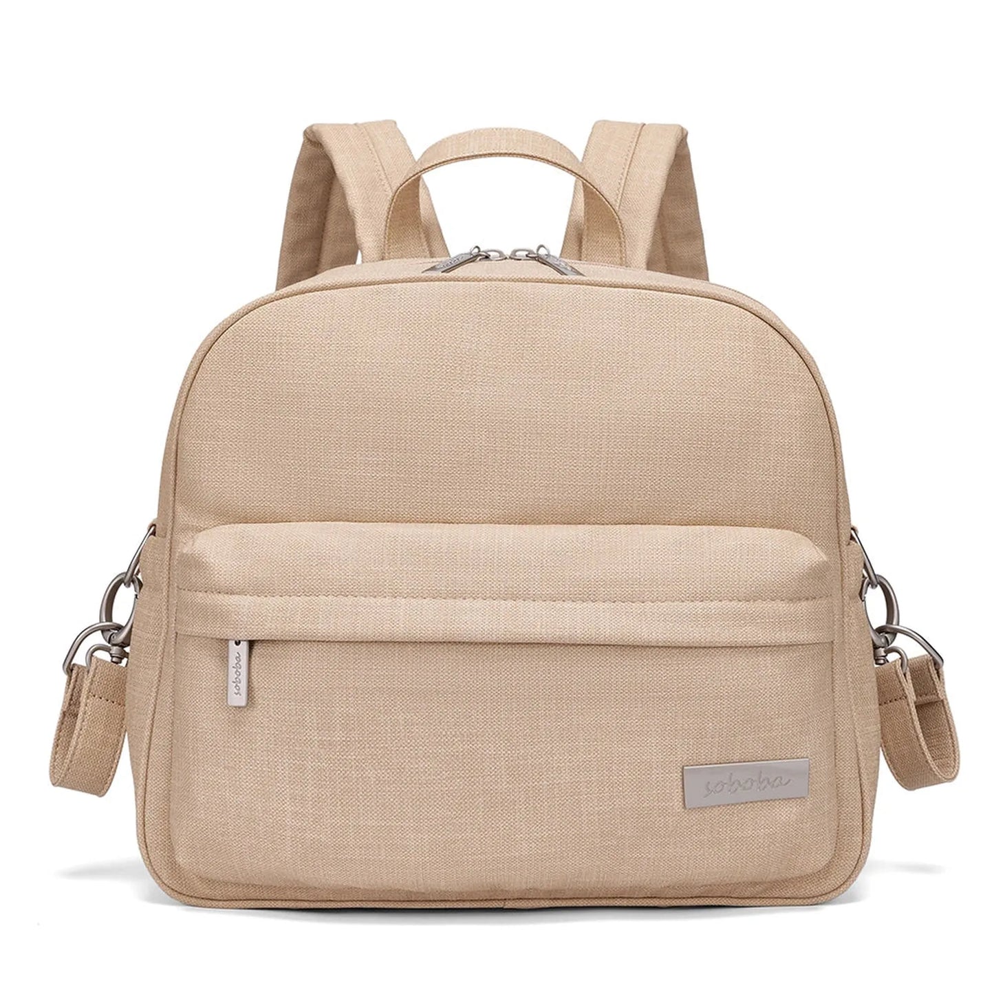 Stylish beige diaper backpack with front pocket, top handle, and adjustable straps.