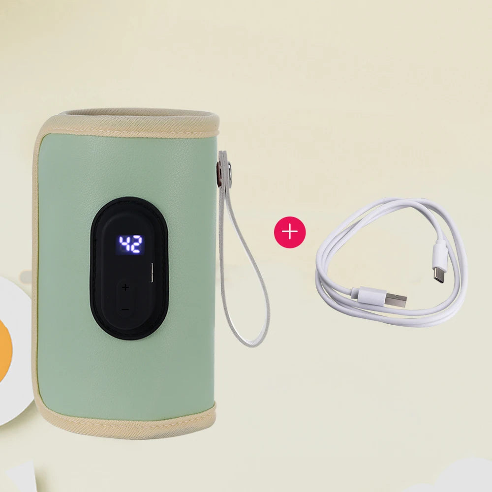 Mint green portable USB bottle warmer with digital display and white charging cable.
