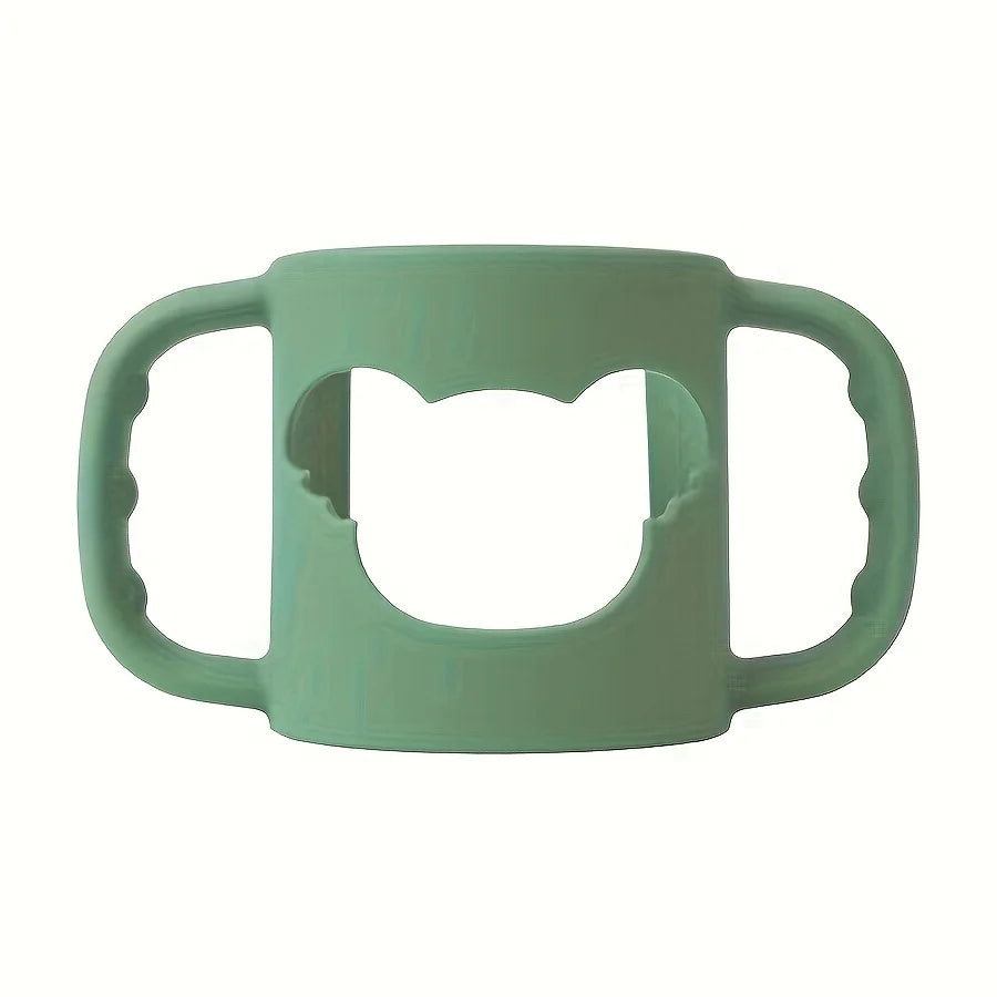 Soft green silicone baby bottle handle with a bear-shaped cutout, designed for easy grip.